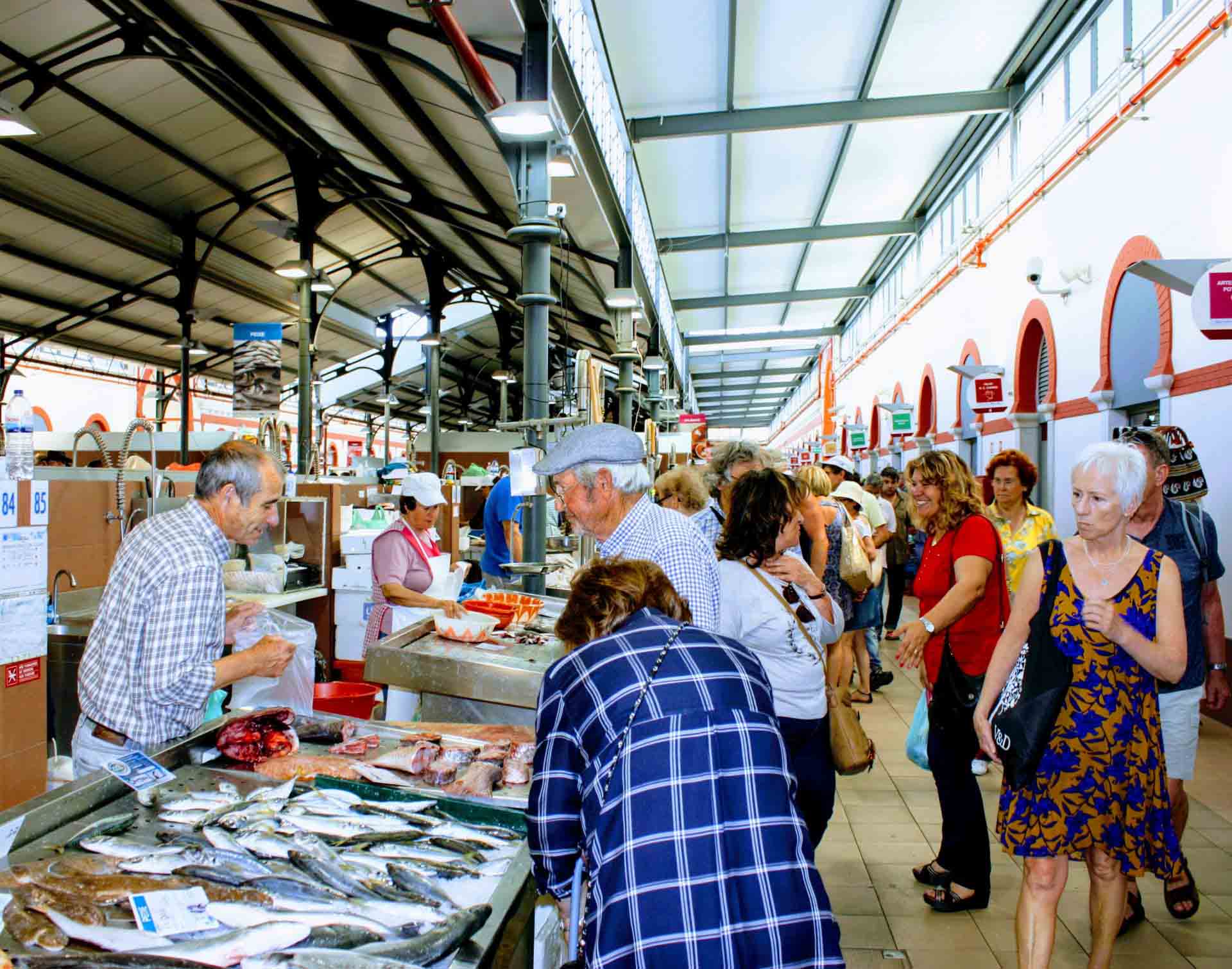 shoppers at the fish market in Tavira