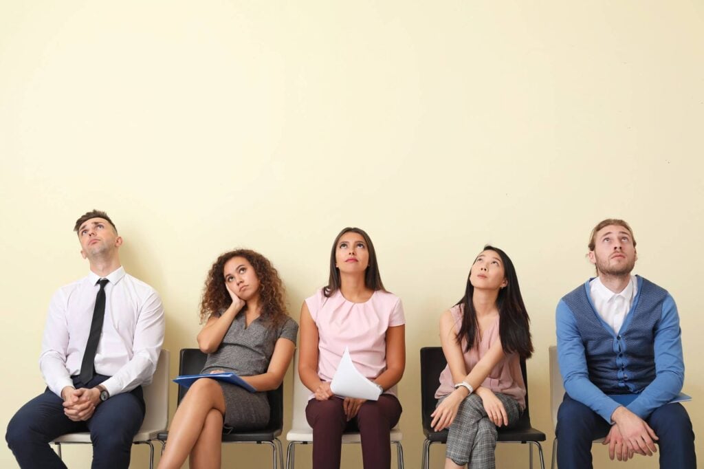 group of people waiting for an appointment