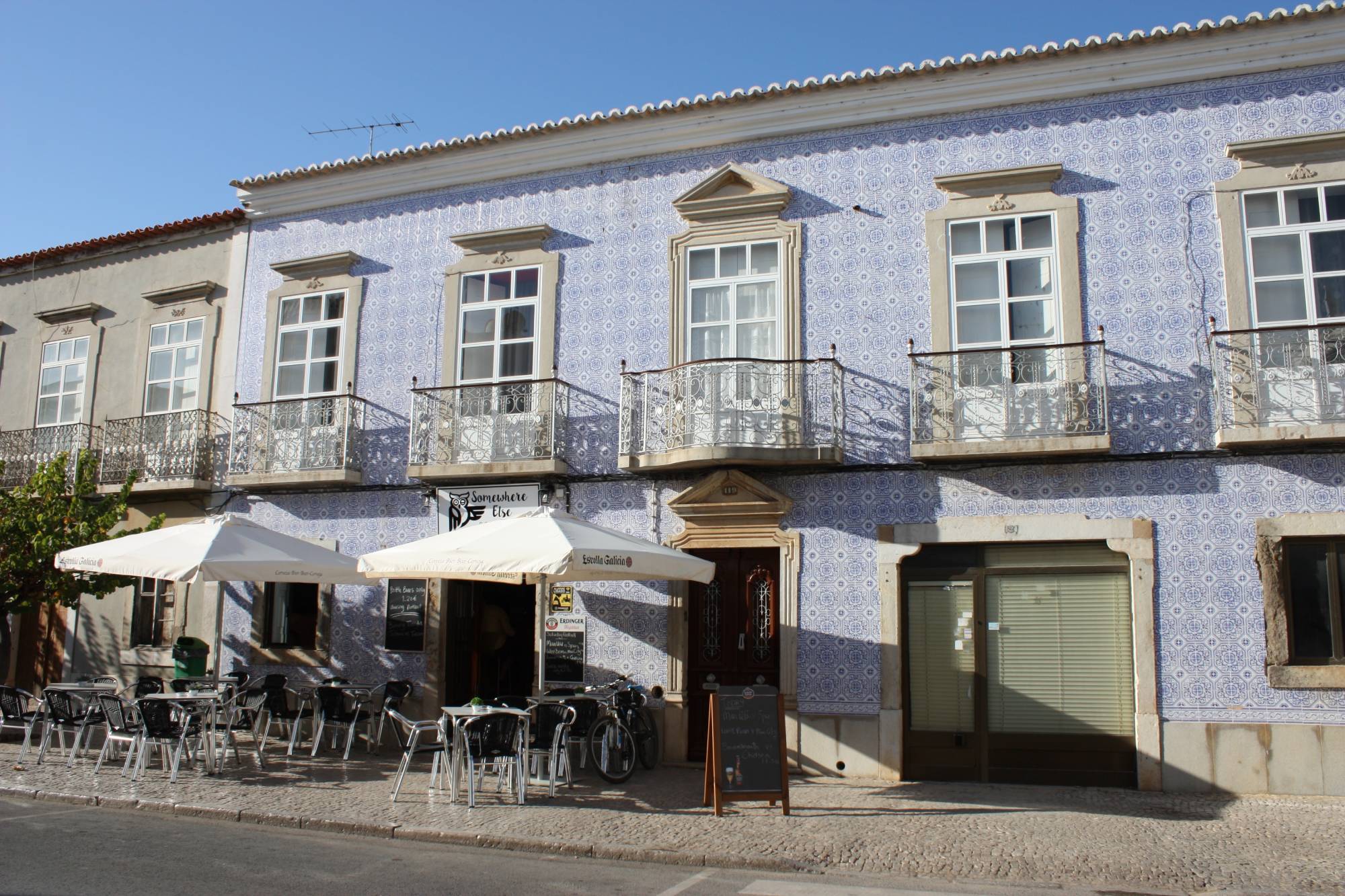 tavira purple tiled building
